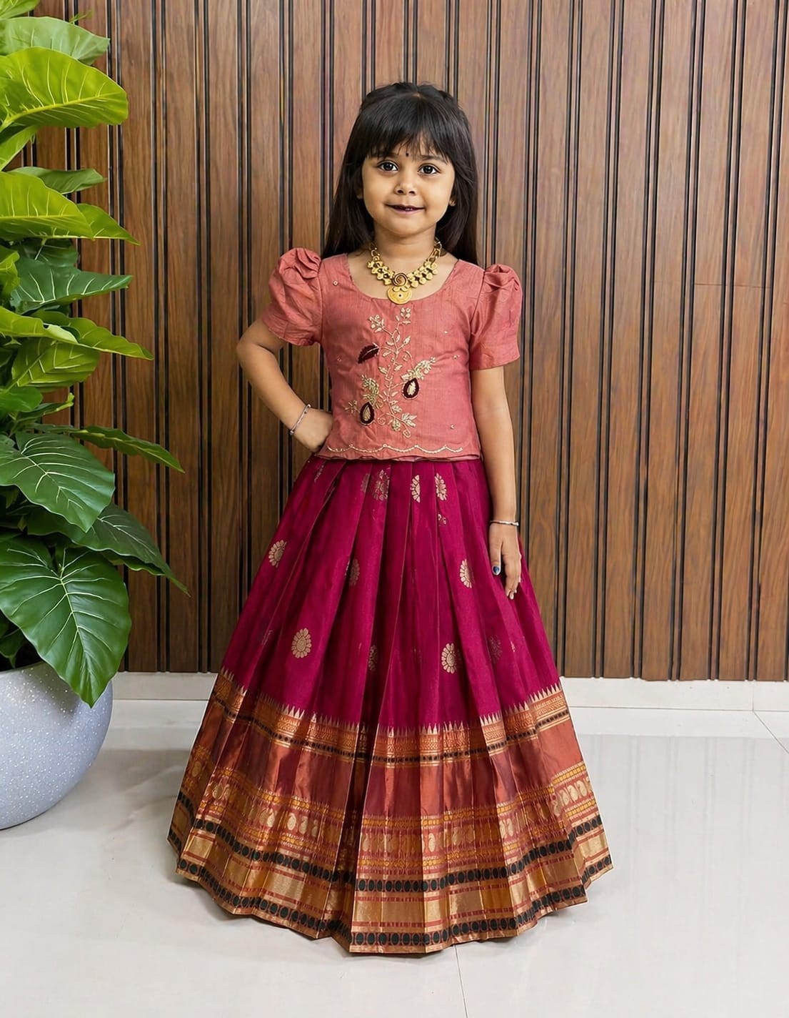Pattu Pavadai Deep Maroon or Magenta with a gold zari